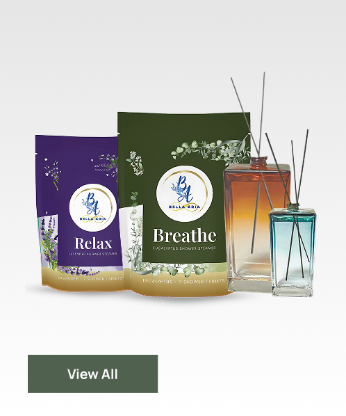 Bella Aria Relax lavender and Breathe eucalyptus shower steamers with two glass reed diffusers.